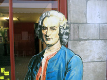 Rousseau en la puerta de su casa natal (foto de Vila-Matas)